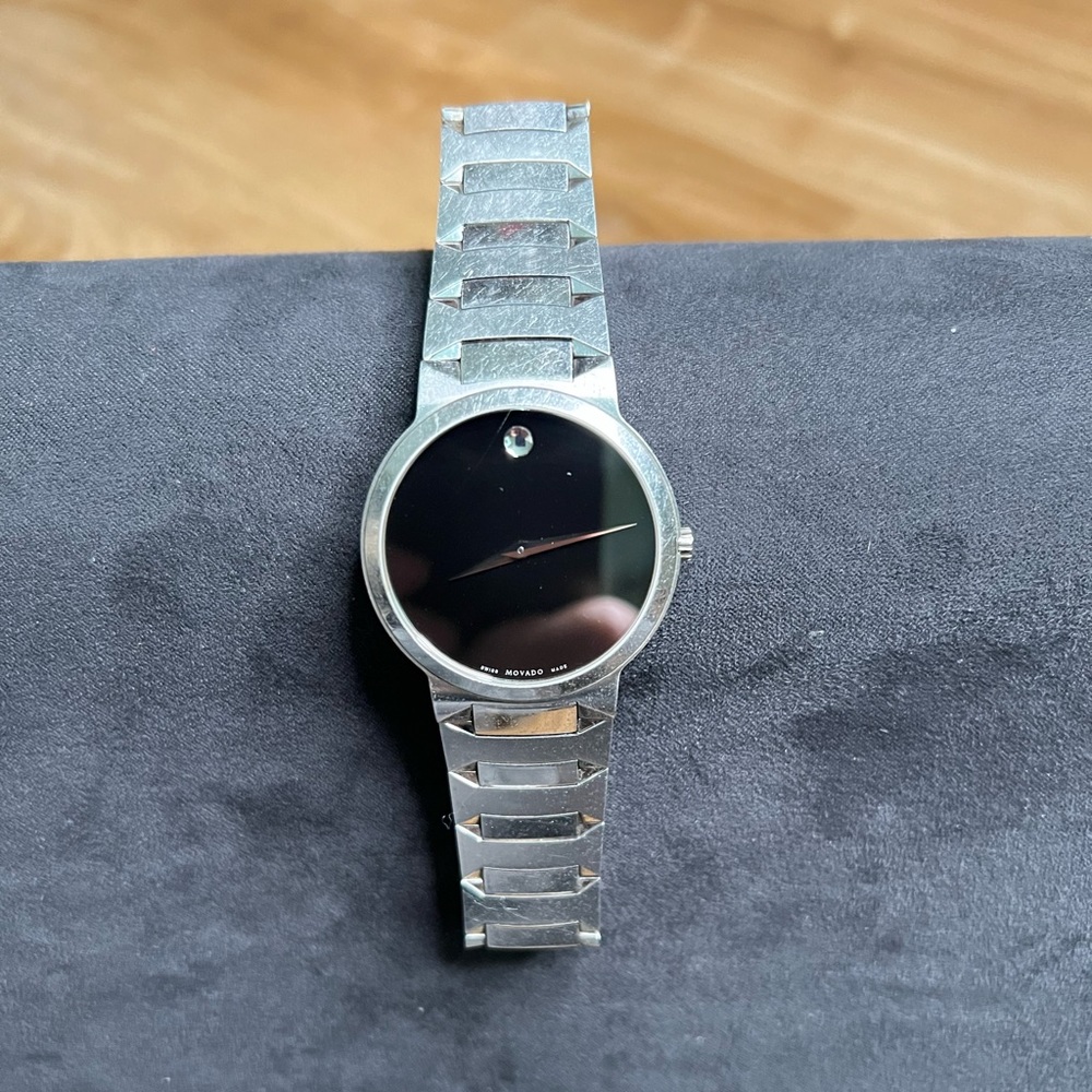Movado Men’s Museum Classic watch w/stainless Steel bracket and sapphire dial.